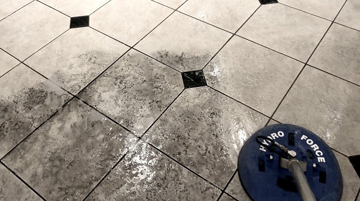 Professional tile and grout cleaning with rotary extraction equipment after a renovation in San Diego